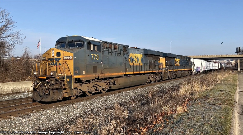 CSX 773 leads M369 west on 2 track.